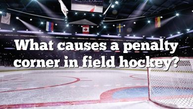 What causes a penalty corner in field hockey?