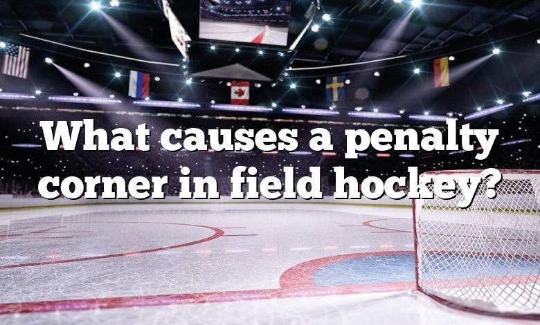 What causes a penalty corner in field hockey?