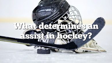 What determines an assist in hockey?