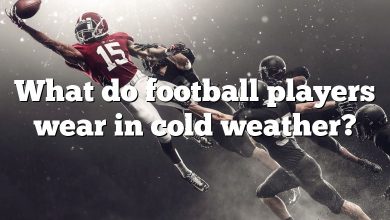 What do football players wear in cold weather?