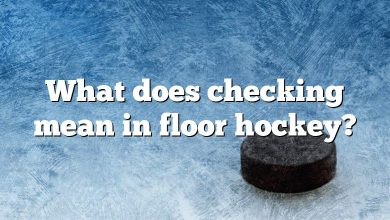 What does checking mean in floor hockey?