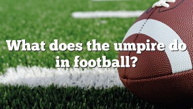 What does the umpire do in football?