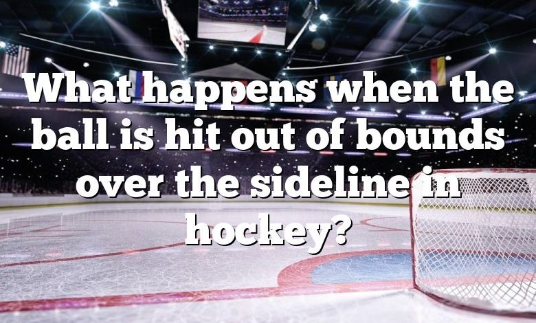What happens when the ball is hit out of bounds over the sideline in hockey?
