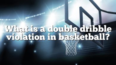 What is a double dribble violation in basketball?