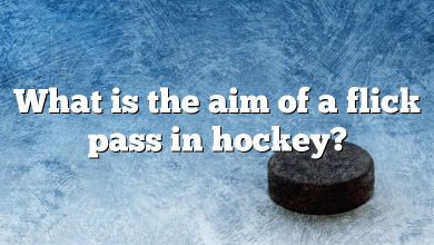 What is the aim of a flick pass in hockey?