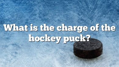 What is the charge of the hockey puck?