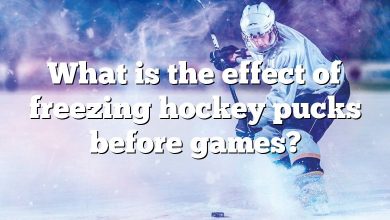 What is the effect of freezing hockey pucks before games?