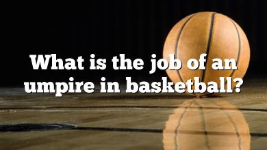 What is the job of an umpire in basketball?
