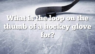 What is the loop on the thumb of a hockey glove for?
