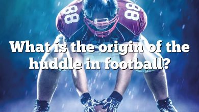 What is the origin of the huddle in football?