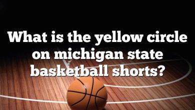 What is the yellow circle on michigan state basketball shorts?