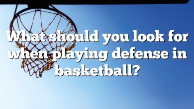 What should you look for when playing defense in basketball?