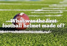 What was the first football helmet made of?