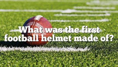 What was the first football helmet made of?