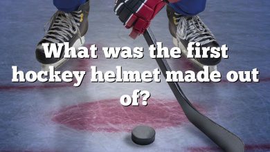 What was the first hockey helmet made out of?