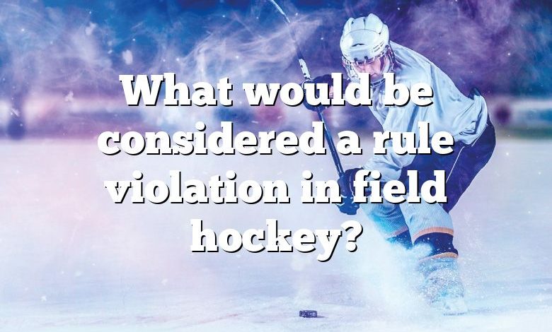 What would be considered a rule violation in field hockey?