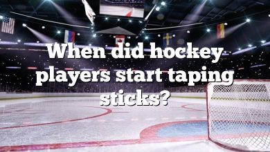 When did hockey players start taping sticks?