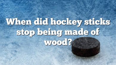 When did hockey sticks stop being made of wood?