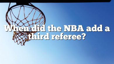 When did the NBA add a third referee?