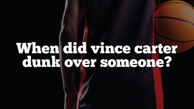 When did vince carter dunk over someone?