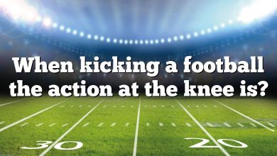 When kicking a football the action at the knee is?