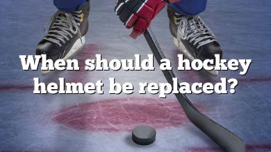 When should a hockey helmet be replaced?