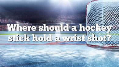 Where should a hockey stick hold a wrist shot?