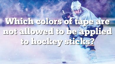 Which colors of tape are not allowed to be applied to hockey sticks?