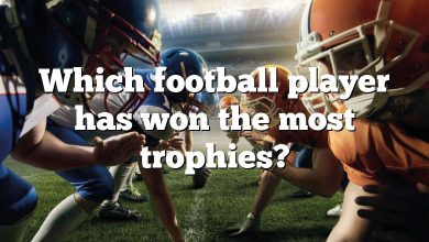 Which football player has won the most trophies?