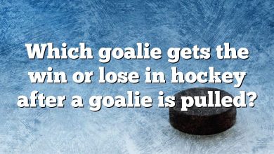 Which goalie gets the win or lose in hockey after a goalie is pulled?