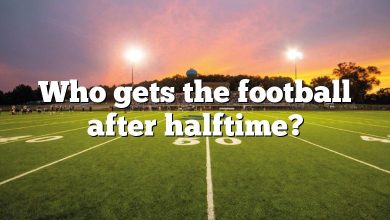 Who gets the football after halftime?