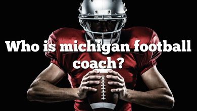 Who is michigan football coach?