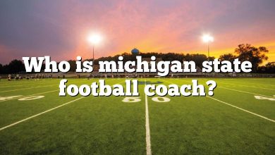 Who is michigan state football coach?