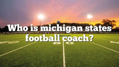 Who is michigan states football coach?