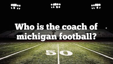 Who is the coach of michigan football?