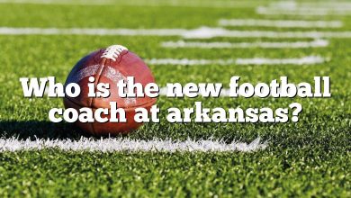 Who is the new football coach at arkansas?