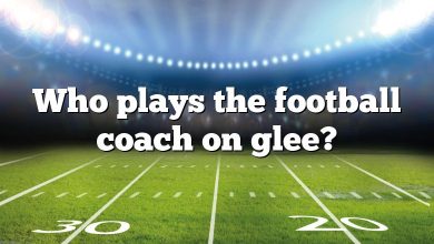 Who plays the football coach on glee?