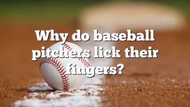 Why do baseball pitchers lick their fingers?