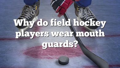 Why do field hockey players wear mouth guards?