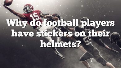 Why do football players have stickers on their helmets?