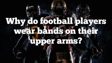 Why do football players wear bands on their upper arms?