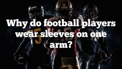 Why do football players wear sleeves on one arm?