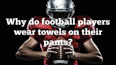 Why do football players wear towels on their pants?