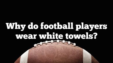 Why do football players wear white towels?