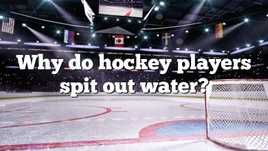 Why do hockey players spit out water?