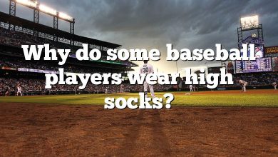 Why do some baseball players wear high socks?