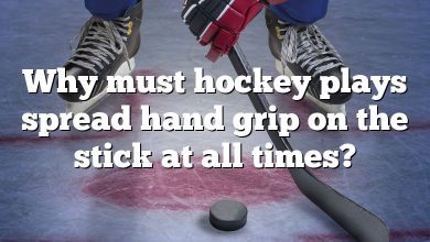 Why must hockey plays spread hand grip on the stick at all times?