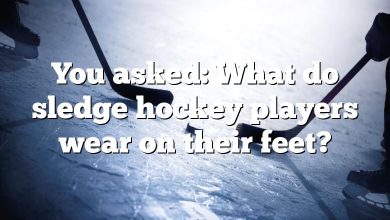 You asked: What do sledge hockey players wear on their feet?